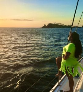 A couple enjoying their 5 days in Costa Rica on a sunset catamaran tour.