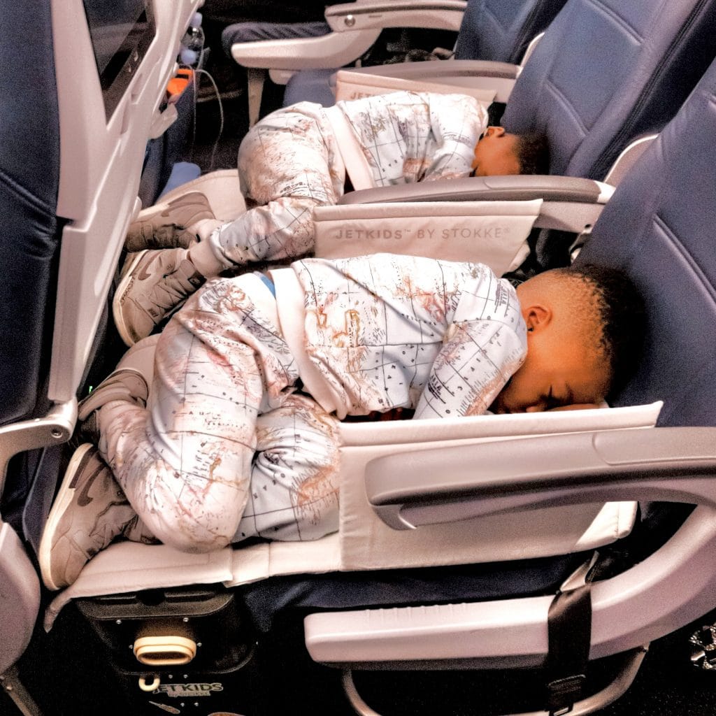 My toddlers sleep on plane with the JetKids Bed Box.