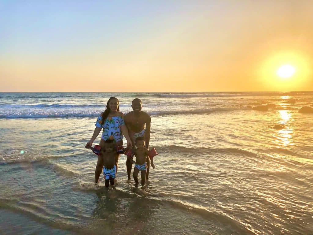 A family enjoying their Costa Ricafamily vacation at Playa Avellanas, in Guanacaste. 