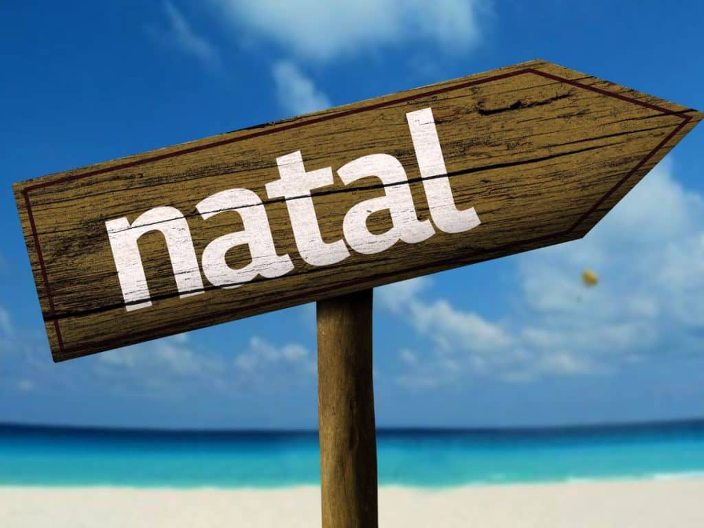 Wooden Natal sign on the beach in Northeast Brazil 