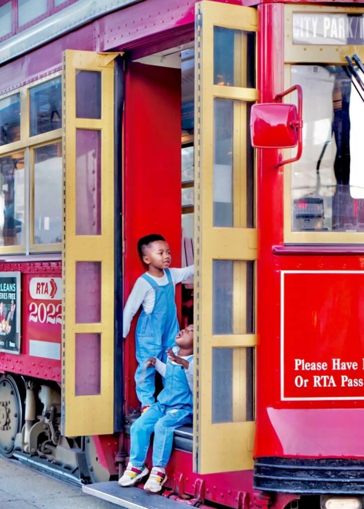 The boys on one of NOLA's charming streetcars. 