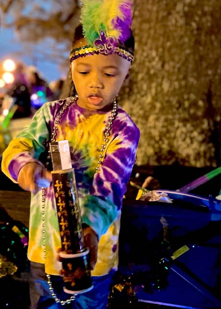 My son in his tie-dye Marti Gras attire.