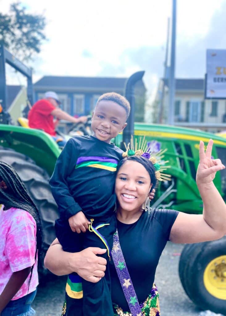 My son on my shoulders during New Orleans Marti Gras.