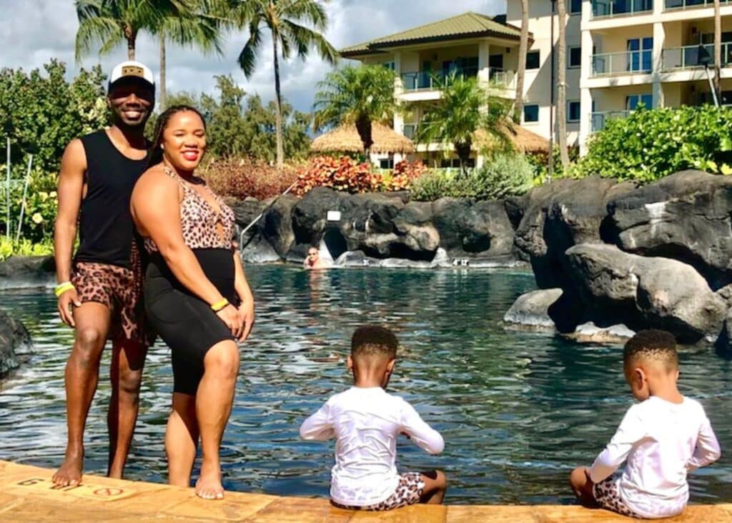 My family and I enjoying time at our hotel pool, a relaxing part of our Kauai 3 day itinerary.