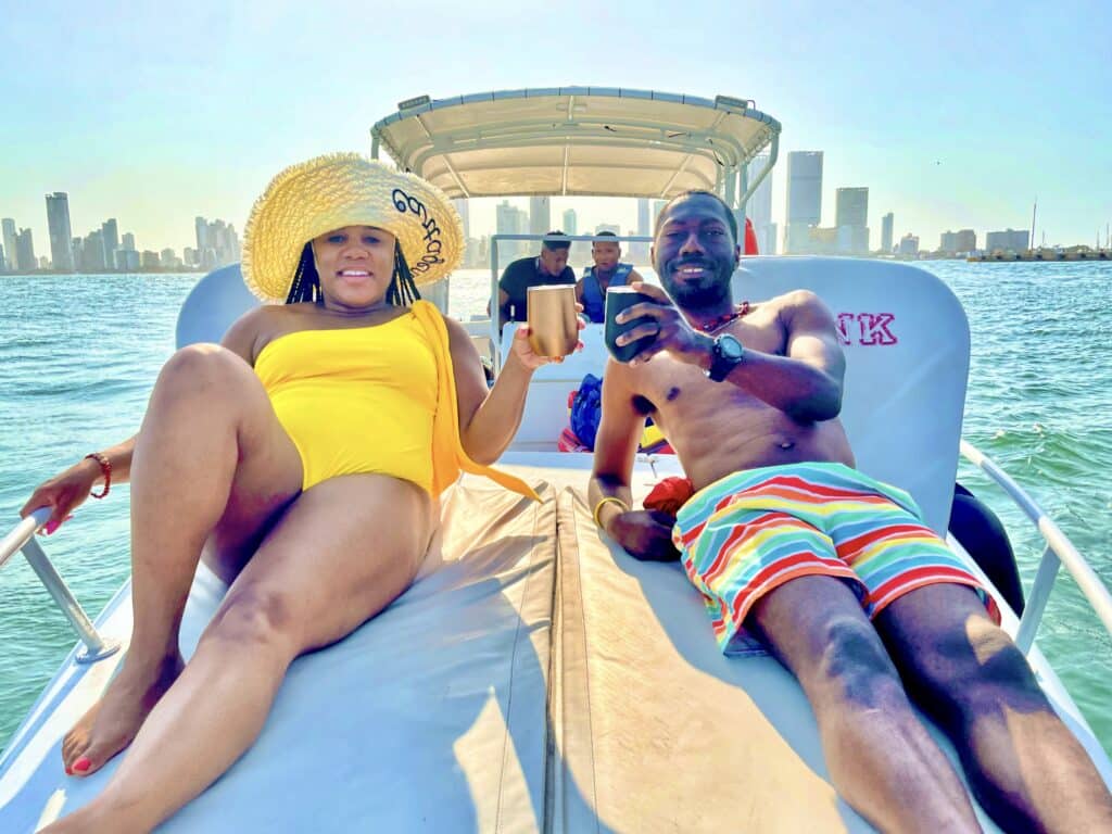 My husband and I on a Rosario Islands boat tour, enjoying a few drinks in sunny Cartagena.