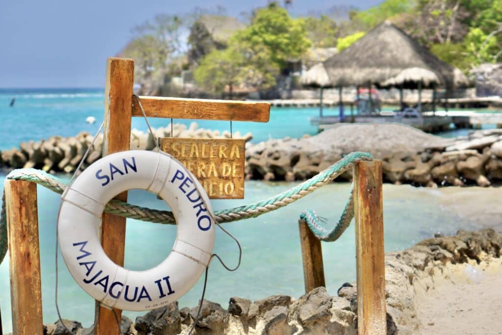 San Pedro Majagua II beach with palm hut- a beautiful private island on Rosario islands. A must add to a Cartagena Travel Guide