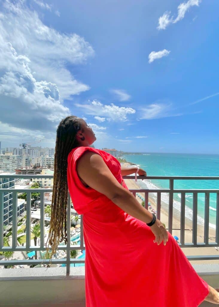 Me enjoying the gorgeous ocean views from my balcony at the San Juan Marriott.