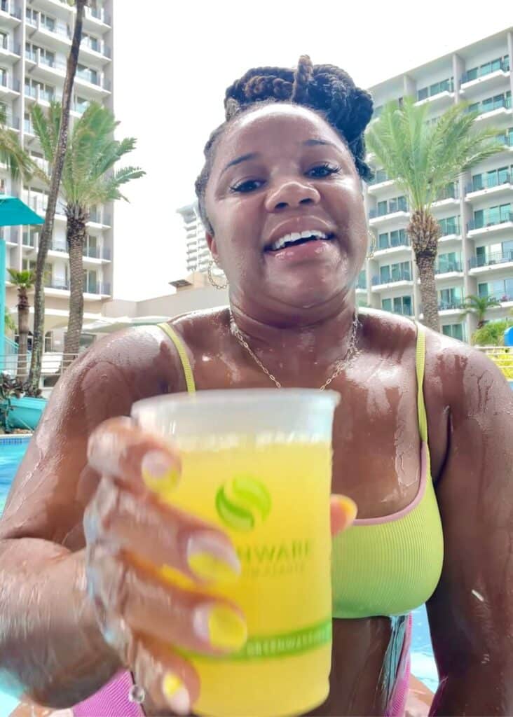 Enjoying some pool time and a refreshing cocktail in San Juan.