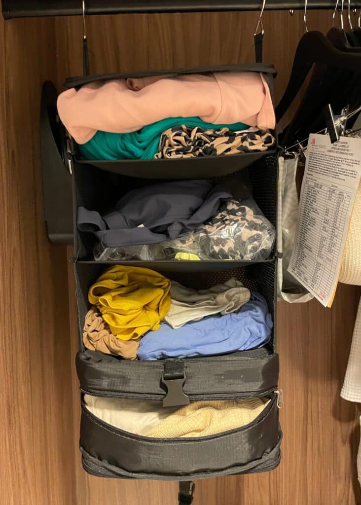 My portable wardrobe stocked and hanging in the hotel closet. 