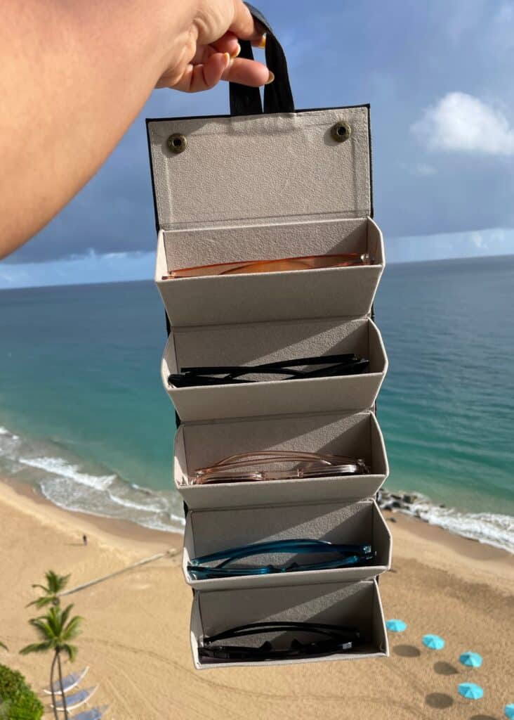 A sunglasses organizer that fits 5 pairs neatly for your trip. 