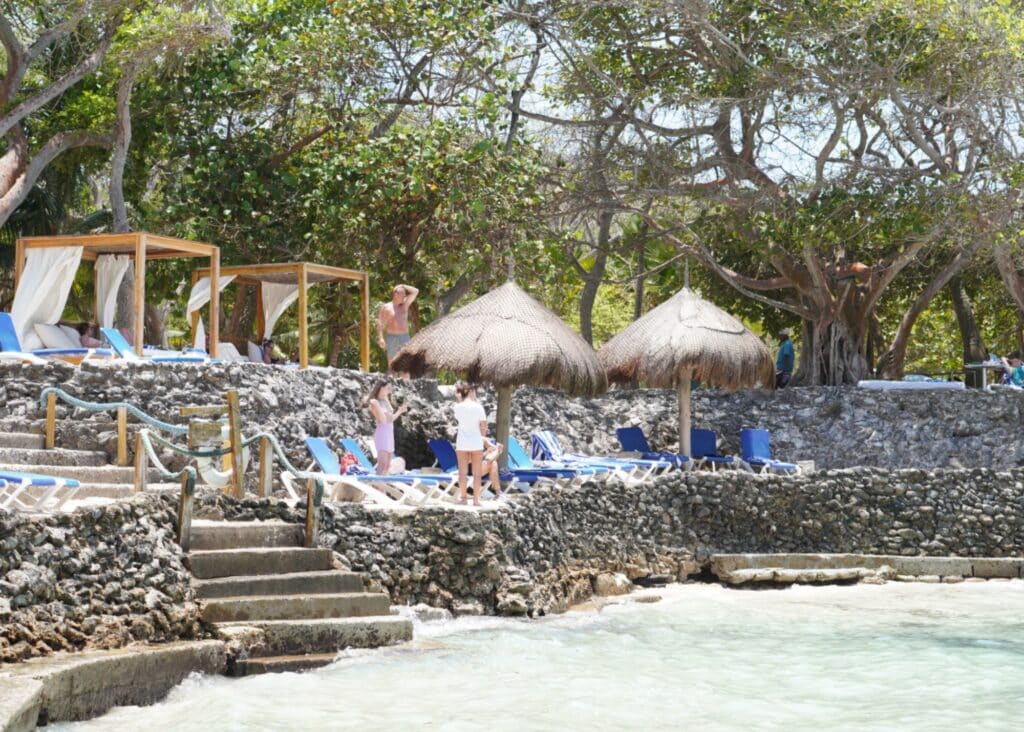 Sun beds and beach chairs at Bora Bora Beach Club.