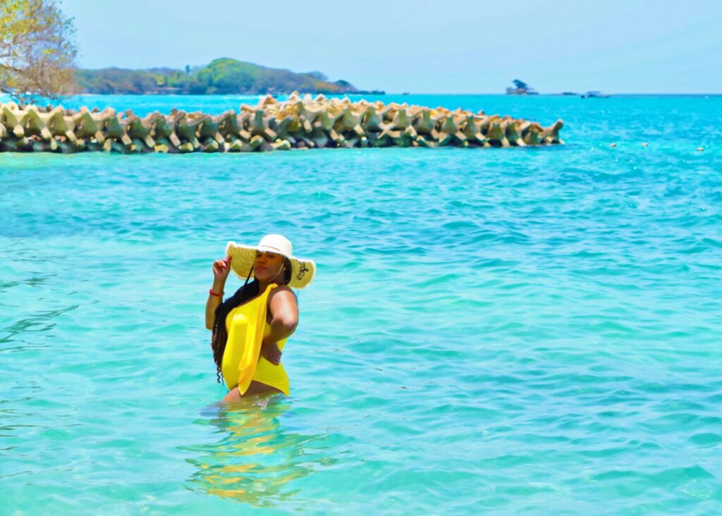 Enjoying the crystal-clear waters of the Rosario Islands in my sun hat.