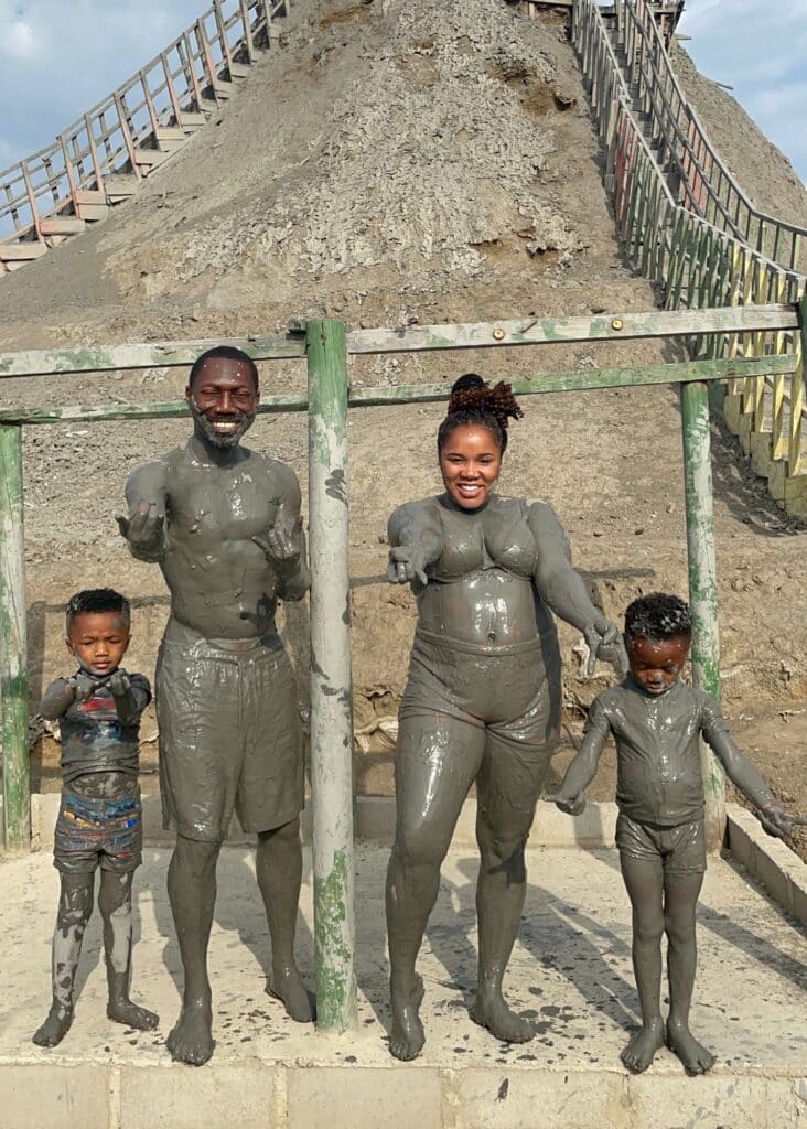 My family and I, covered head-to-toe in mud, on our Volcan de Totumo day trip from Cartagena.