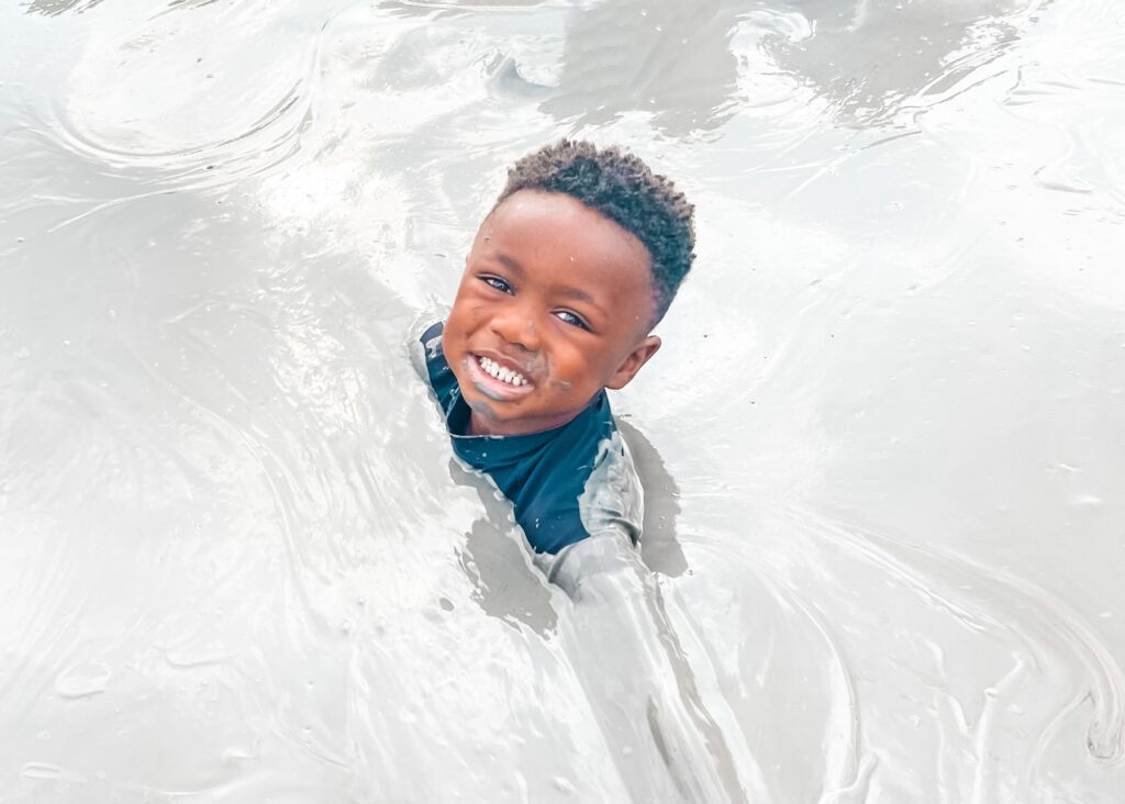 My son floating around in the mud in Volcán del Totumo.